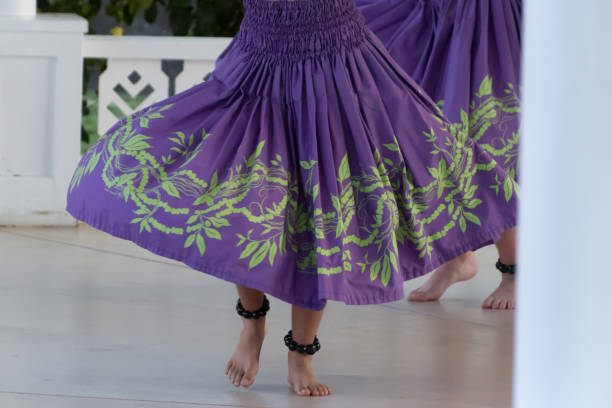 Legs of hula dancers performing in Waikoloa - 2 stock photo
