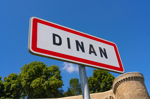 Dinan road sign french Bretagne Britanny picturesque town in France. Walled Breton town in the Côtes-d'Armor
