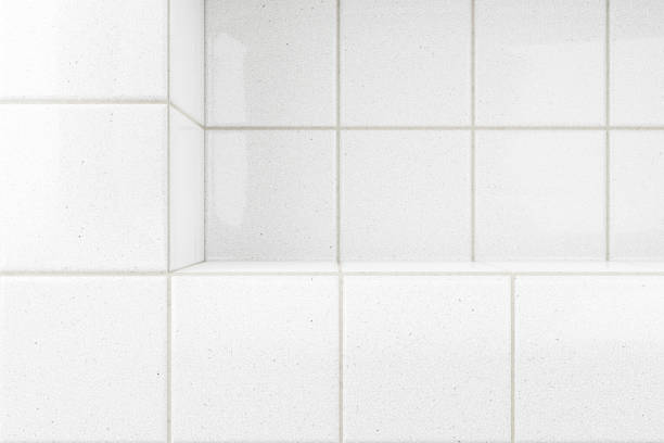 istock White glossy tiles bathroom or kitchen background with podium 1433297647