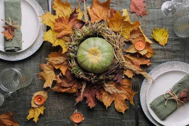 istock Thanksgiving dinner table setting. Autumnal festive feast. Top view. 1433299111