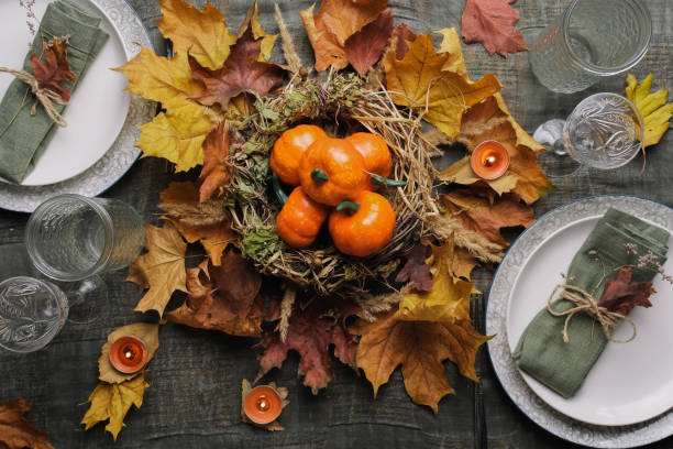 istock Thanksgiving feast table setting. Table decoration for autumnal holiday. 1433299112