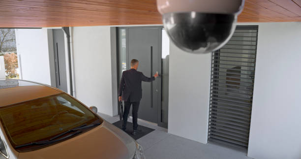 istock Man's finger pressing on fingerprint scanner to enter his house 1433308658