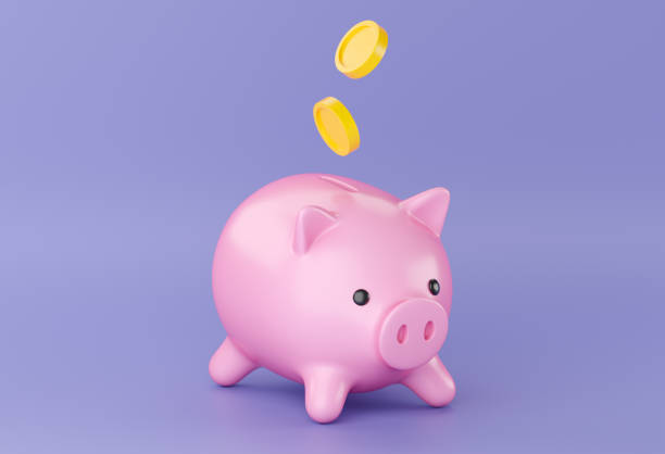 istock 3d Piggy bank with falling money 1433309127