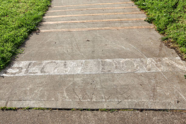 istock slow down sign on bike path 1433310383