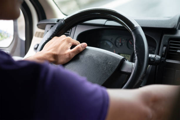 istock Controlling on car's steering wheel. 1433311868