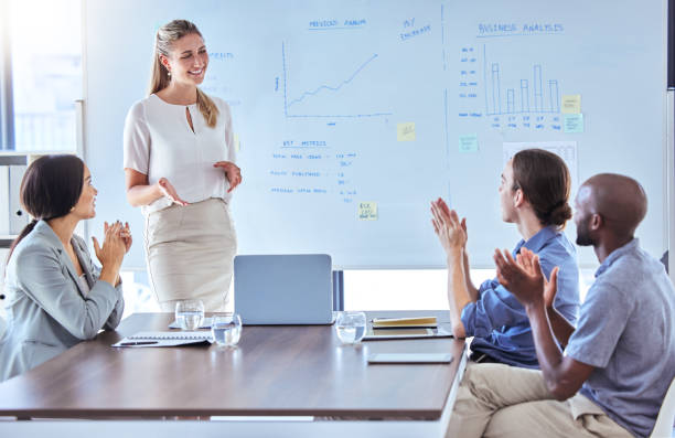 istock Clapping, success workshop or teamwork business meeting for happy creative marketing speaker on office whiteboard. Diversity, motivation or planning kpi data idea in training or strategy presentation 1433312438