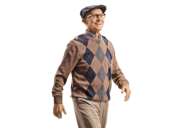 istock Senior gentleman walking and smiling 1433314600