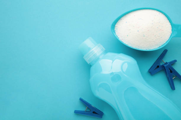 istock Laundry detergents with washing powder on blue background. 1433316675