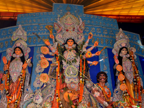 istock Beautiful Goddess Durga idol during Durga pooja celebration. Durga Puja is biggest religious festival of Hinduism 1433317879