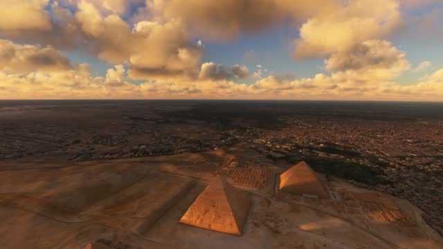 Aerial front view of the Pyramids of Giza, Pyramids of Giza at sunset in Egypt