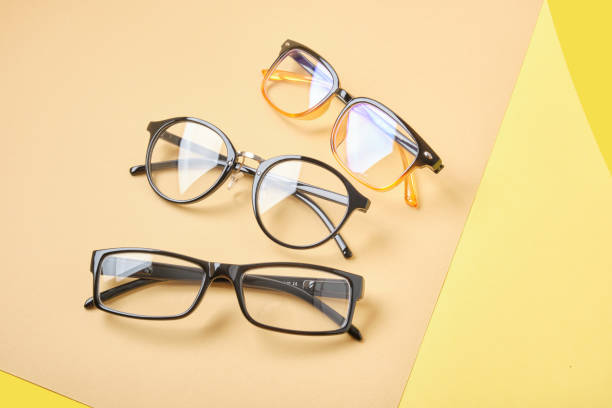 istock several pairs of glasses on a geometric background 1433322668