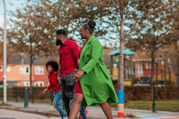 istock Beautiful Family enjoying a walk together 1433323837
