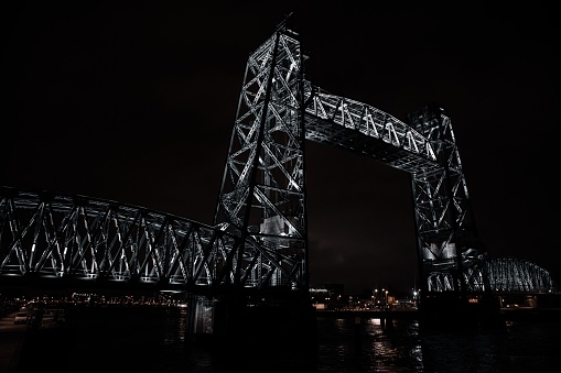 A low angle view of the De Hef bridge during nighttime