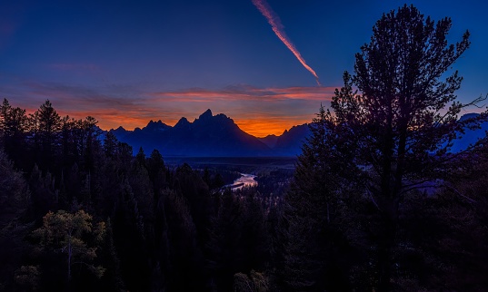 A beautiful view of Snake River at scenic sunset in Grand Teton National Park