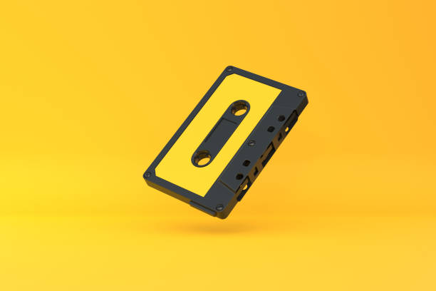 istock Vintage audio tape cassette on a yellow background 1433329696