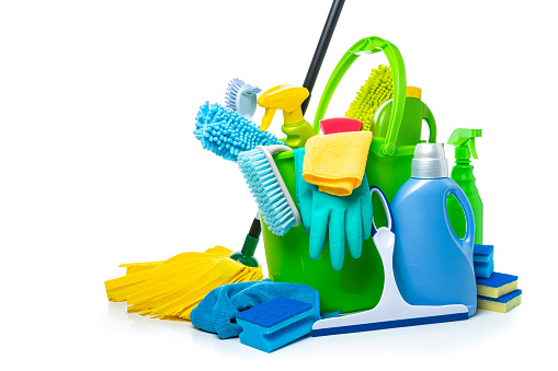 Cleaning concepts: multicolored household cleaning products and tools isolated on white background. Copy space High resolution 42Mp indoors digital capture taken with SONY A7rII and Zeiss Batis 40mm F2.0 CF lens
