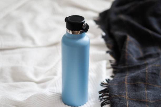 istock Blue water bottle on a blanket background. 1433333564