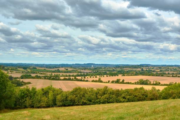 istock Scenic view from the Chiltern hills looking towards an open field on a sunny day 1433338302