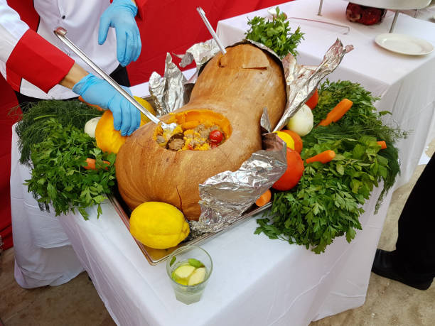istock Baked pumpkin stuffed with rice, meat and vegetables 1433338872