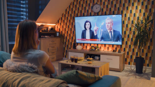 istock Couple watching politics news about sanctions 1433341112