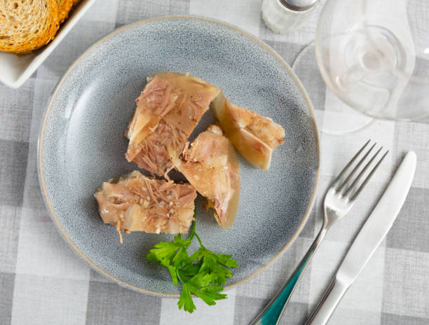 istock Kholodets served on table with parsley sprig 1433341658