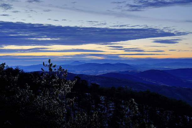 istock Golden sunset over the mountains 1433345115