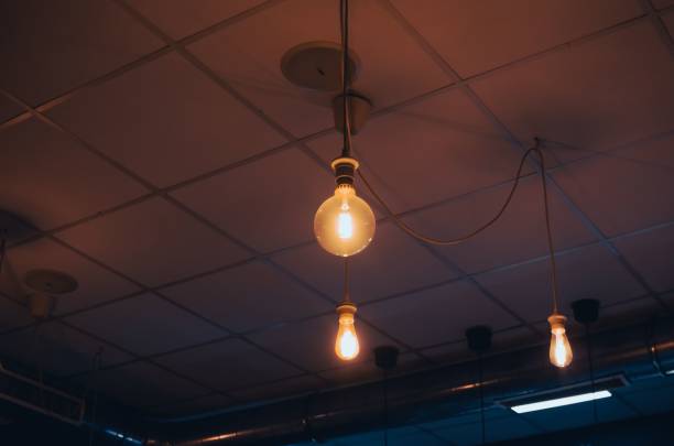 istock Retro tungsten light bulb in a coffee shop 1433345936