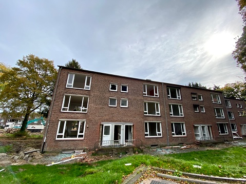 Brunssum, Netherlands - September 27, 2022.  Old apartment buildings are being demolished to make place for new buildings.