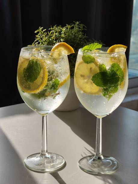 istock Vertical shot of two refreshing mojito cocktails 1433353098