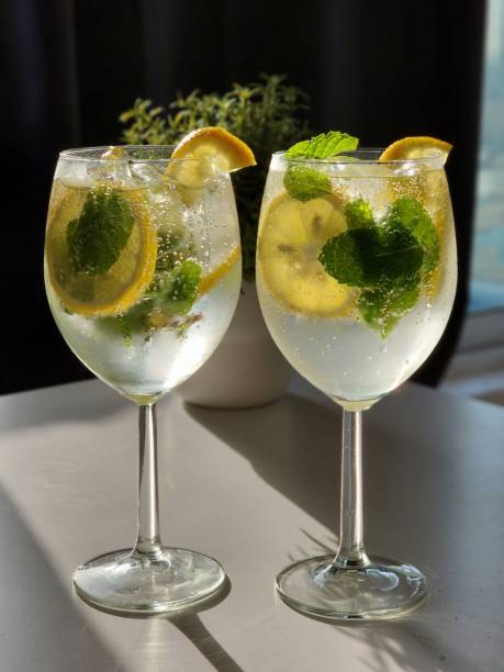 istock Vertical shot of two refreshing mojito cocktails 1433353101