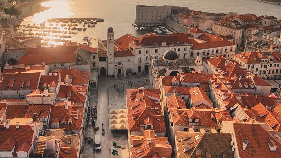 An aerial shot of the old city of Dubrovnik with red-roofed buildings