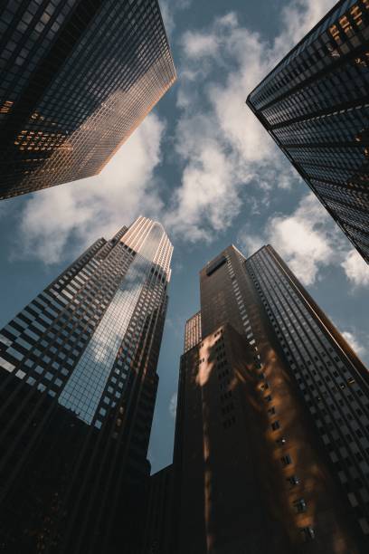 istock Low-angle shot of a skyscrapers with a blue sky 1433354744