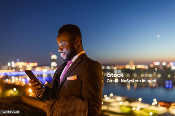 Late Night Text Message Stock Photo - Download Image Now - Businessman, Using Phone, Image-based Social Media