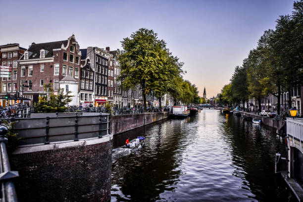 istock Bridge And Dusk Canal View In Amsterdam, The Netherlands 1433357785