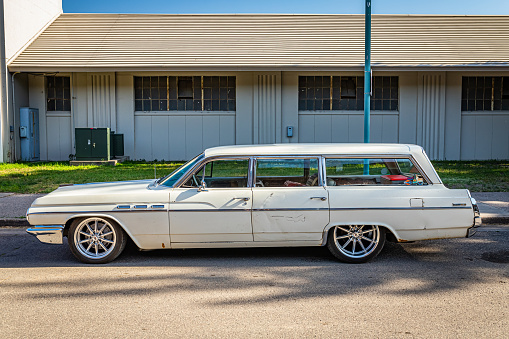 Falcon Heights, MN - June 19, 2022: High perspective side view of a 1963 Buick Invicta Station Wagon at a local car show.