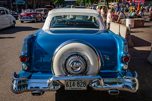 Falcon Heights, MN - June 19, 2022: High perspective rear view of a 1956 Pontiac Star Chief Convertible at a local car show.