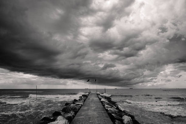 Summer Storm Clouds on Lido di Venezia Beach in Venice, Italy in Monochrome Black and White