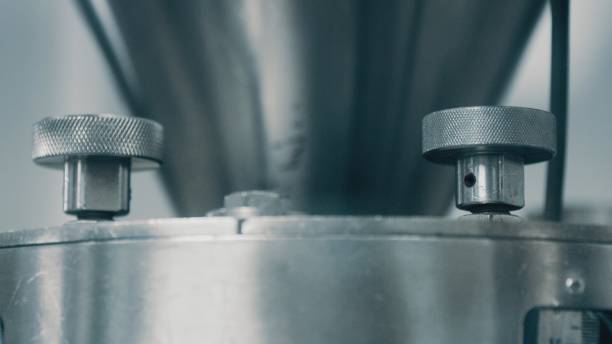 istock Automated mechanical hydraulic machine. Hydraulic machine work. Press for the production of metal products. Manufacturing Machine. Macro shot. Close up, DOF 1433373486