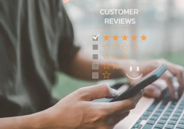 Photo of client give a rating to service experience on the online application, Customer review satisfaction questionnaire feedback survey concept, quality of ranking of the business. customer service.