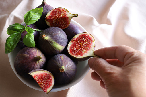 Fresh figs in a bowl. Close-up. Directly above.