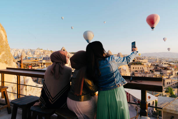 istock female friendship taking selfie photo using smartphone 1433376084