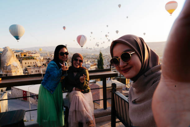istock female friendship taking selfie photo using smartphone 1433376191