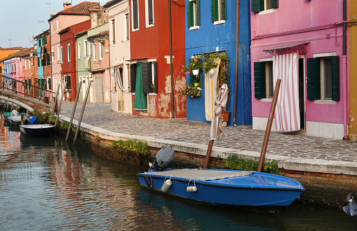Colorful buildings on the canals of Burano Italy.
