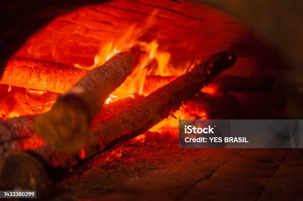 Wood Burning Oven For Baking Pizzas Breads And Calzones Stock Photo - Download Image Now
