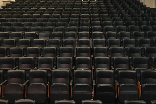istock Theater auditorium with emphasis on the black chairs 1433383038
