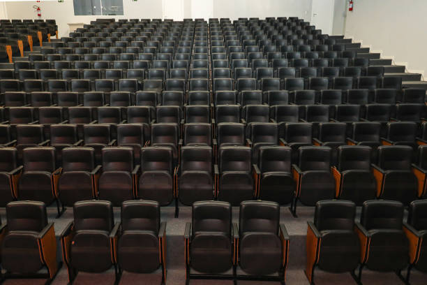 istock Theater auditorium with emphasis on the black chairs 1433383040
