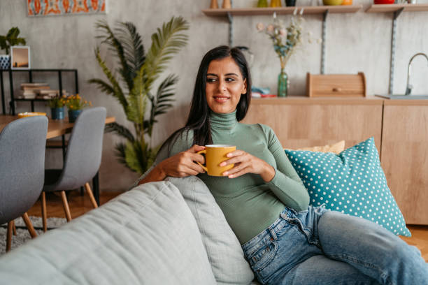 istock Young Woman Drinking Coffee At Home 1433386042