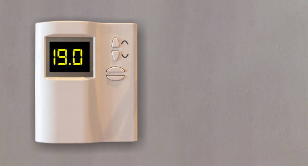 istock Energy saving temperature. Home thermostat to 19 Celsius degrees. 1433387374