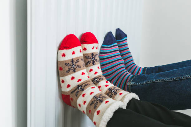 Winter knitted woolen socks on red