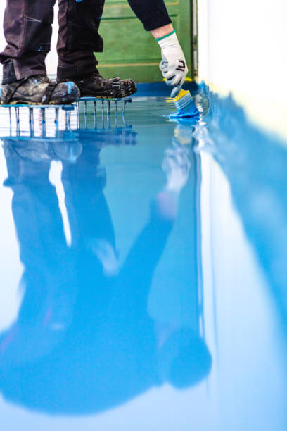 istock Self leveling blue epoxy floor in the gym 1433393748